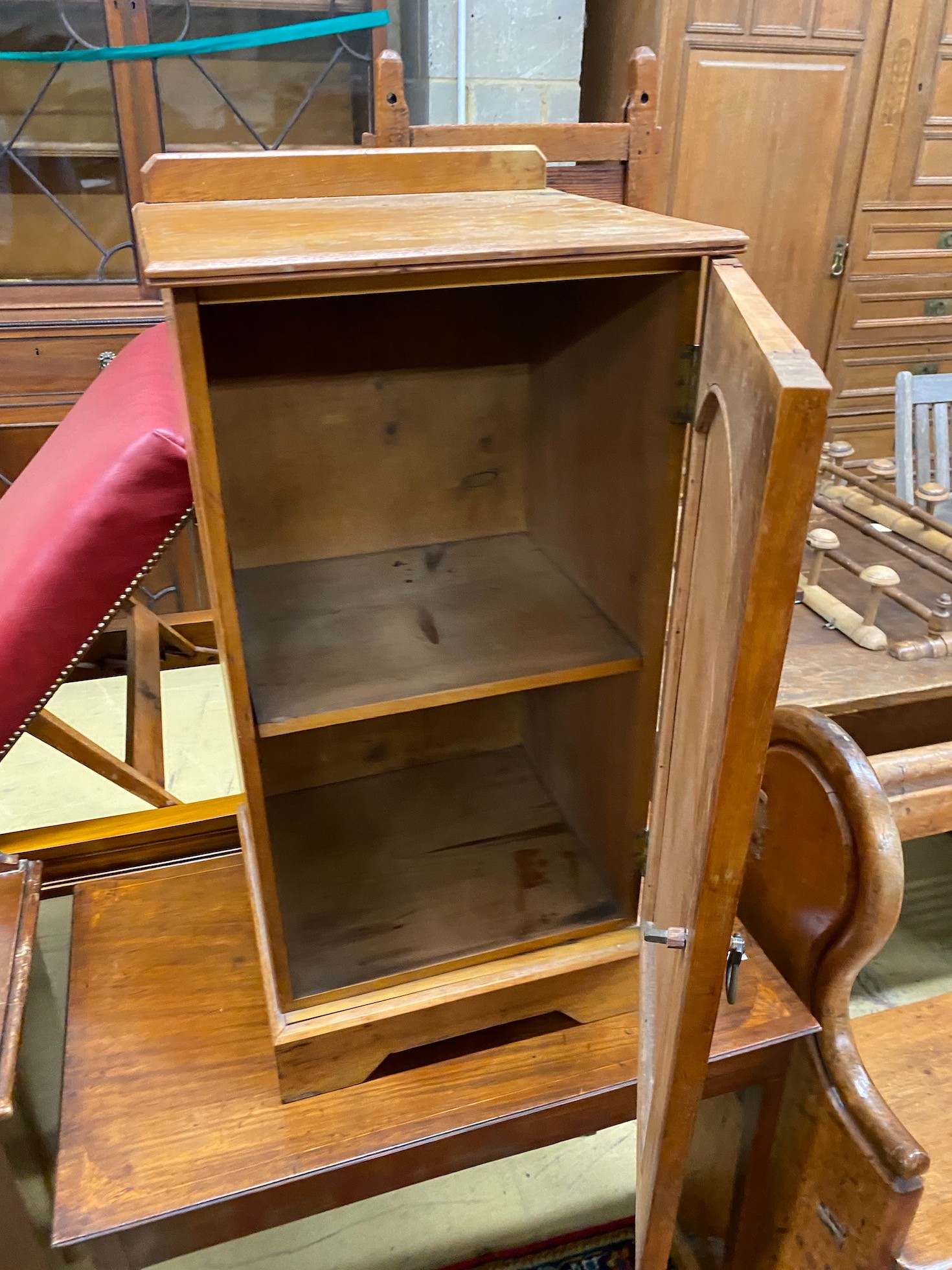 A Victorian inlaid mahogany occasional table, width 73cm and a late Victorian ash bedside cupboard (2)